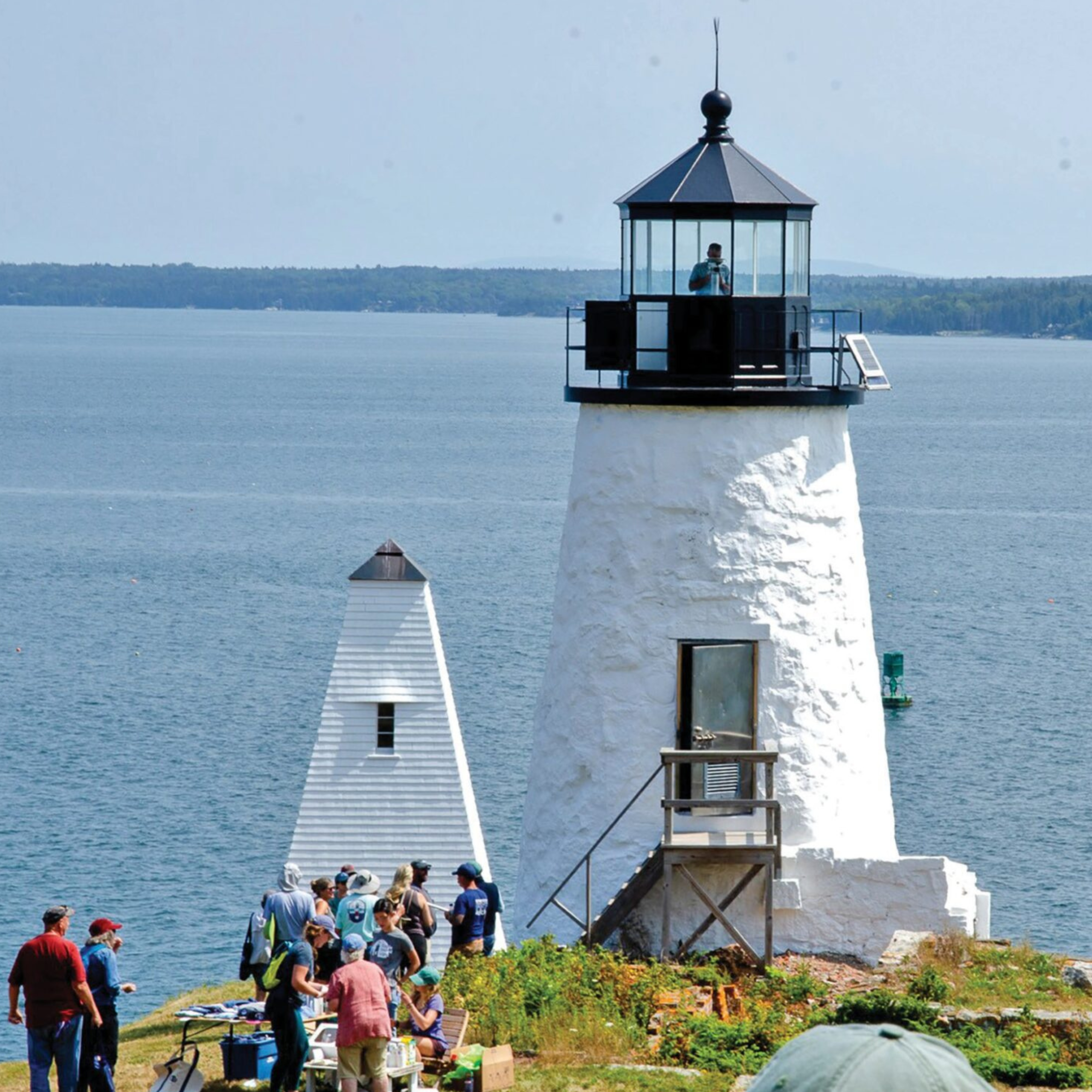 2 Visitors at the August 10 open house take in the views and the history at Eagle Island Light on a spectacular summer day.
