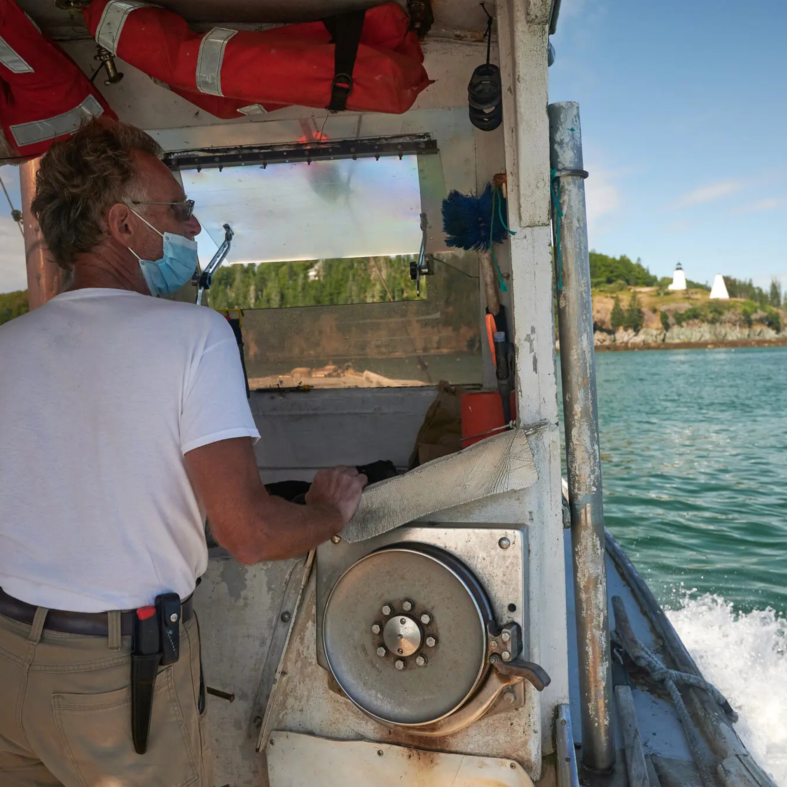 3 Karl Osterby, 63, a boat captain, caretaker of the Quinn family property, and sole year-round resident of Eagle Island, Maine, delivers the day's mail by boat to the several islands in Penobscot Bay.